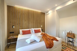 Three-Bedroom Apartment 4 guests | Down comforters, in-room safe, iron/ironing board, free WiFi