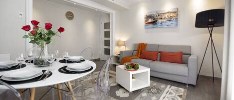 Four-Bedroom Apartment | Living area | Plasma TV