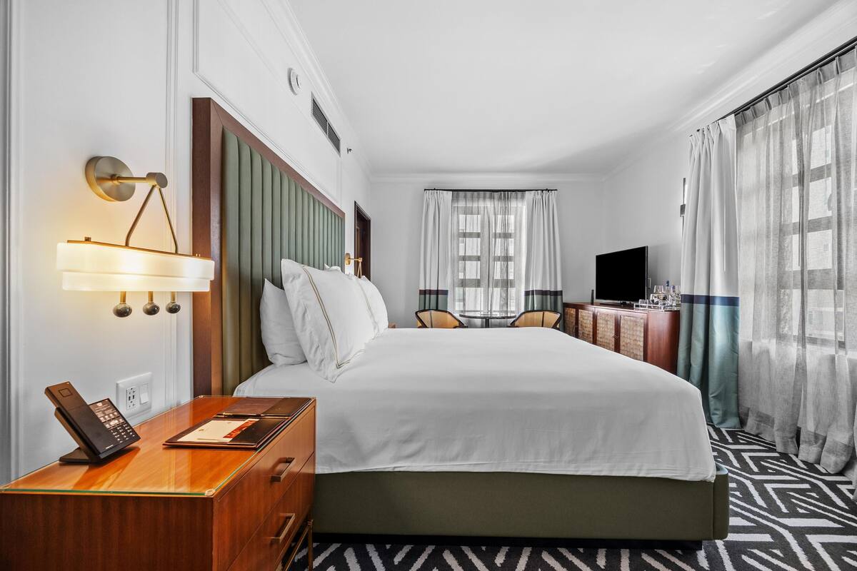 Premium bedding, pillow-top beds, minibar, in-room safe