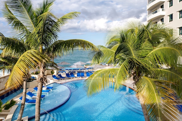 4 outdoor pools, cabanas (surcharge), pool umbrellas