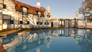 Outdoor pool, pool umbrellas, sun loungers