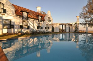Outdoor pool, pool umbrellas, sun loungers