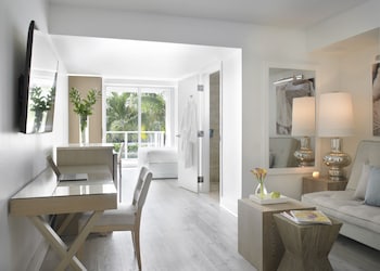 Egyptian cotton sheets, premium bedding, in-room safe, laptop workspace at Grand Beach Hotel Surfside West