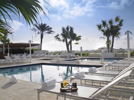 2 outdoor pools, sun loungers