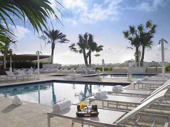 2 outdoor pools, sun loungers at Grand Beach Hotel Surfside West