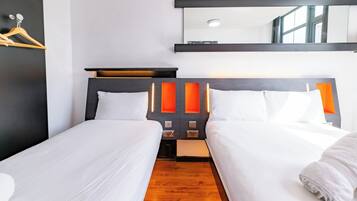 Family Triple Room with window | Premium bedding, in-room safe, soundproofing, iron/ironing board