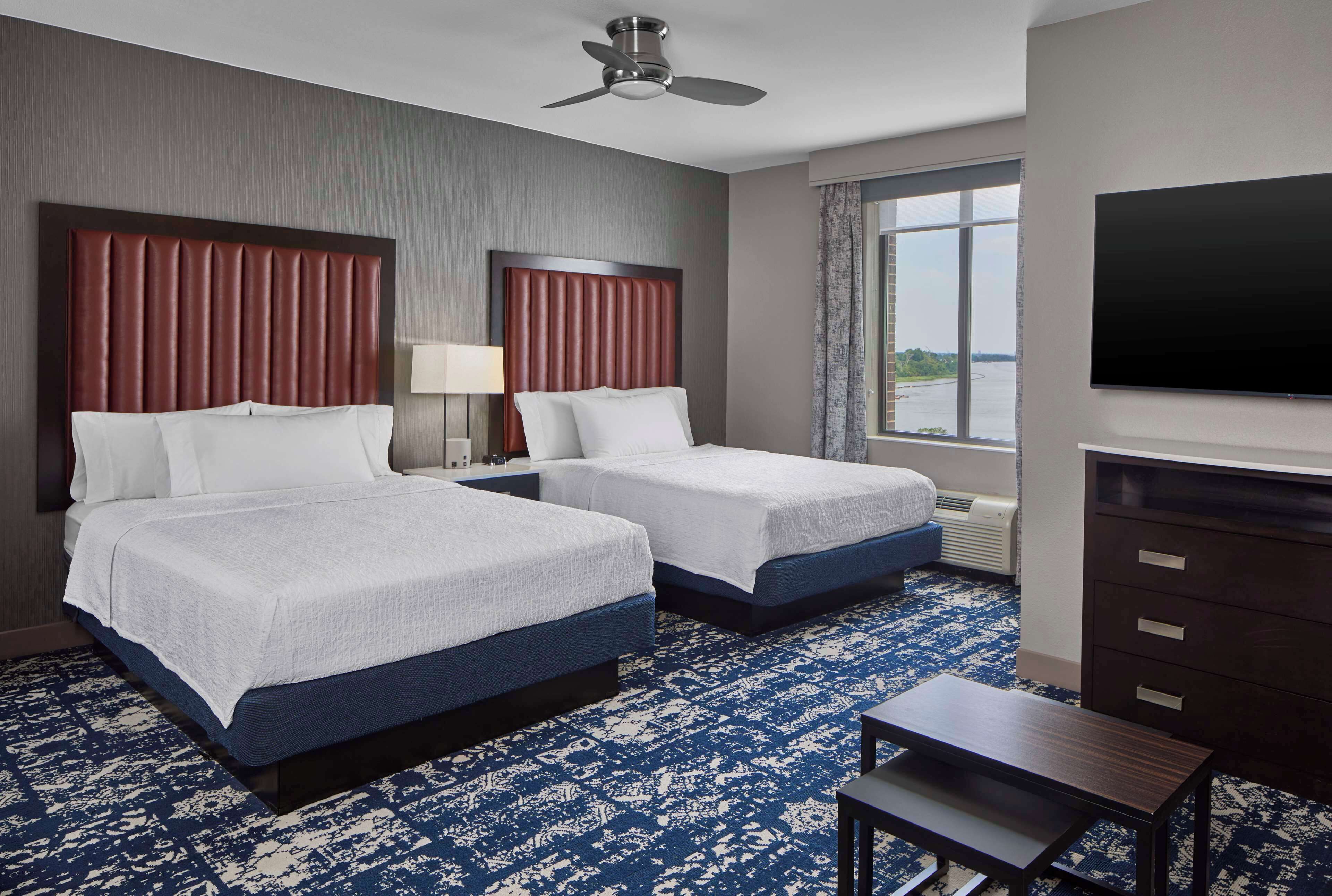 premium bedding, desk, laptop workspace, blackout curtains