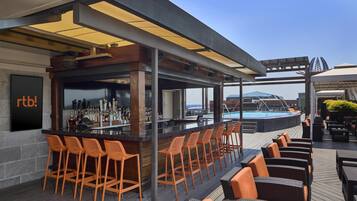 Outdoor pool, free cabanas, pool umbrellas