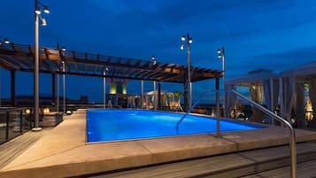 Outdoor pool, free cabanas, pool umbrellas