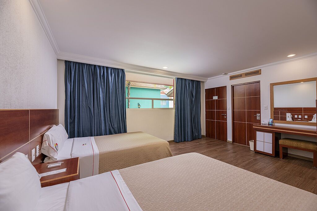Habitación superior, 2 camas matrimoniales | Ropa de cama de alta calidad y caja de seguridad en la habitación 