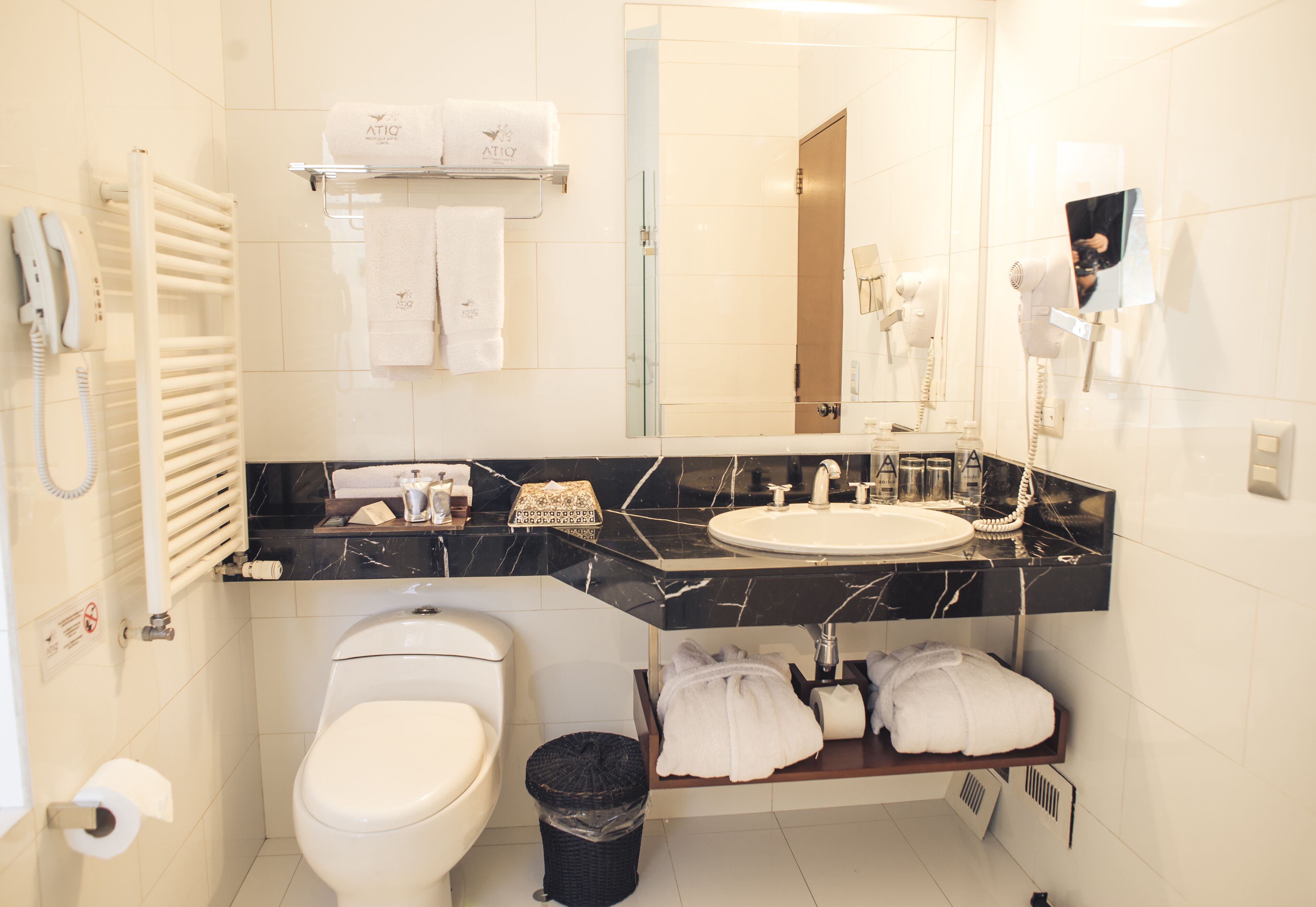 deluxe suite, jetted tub | bathroom | rainfall showerhead, free toiletries, hair dryer, bathrobes