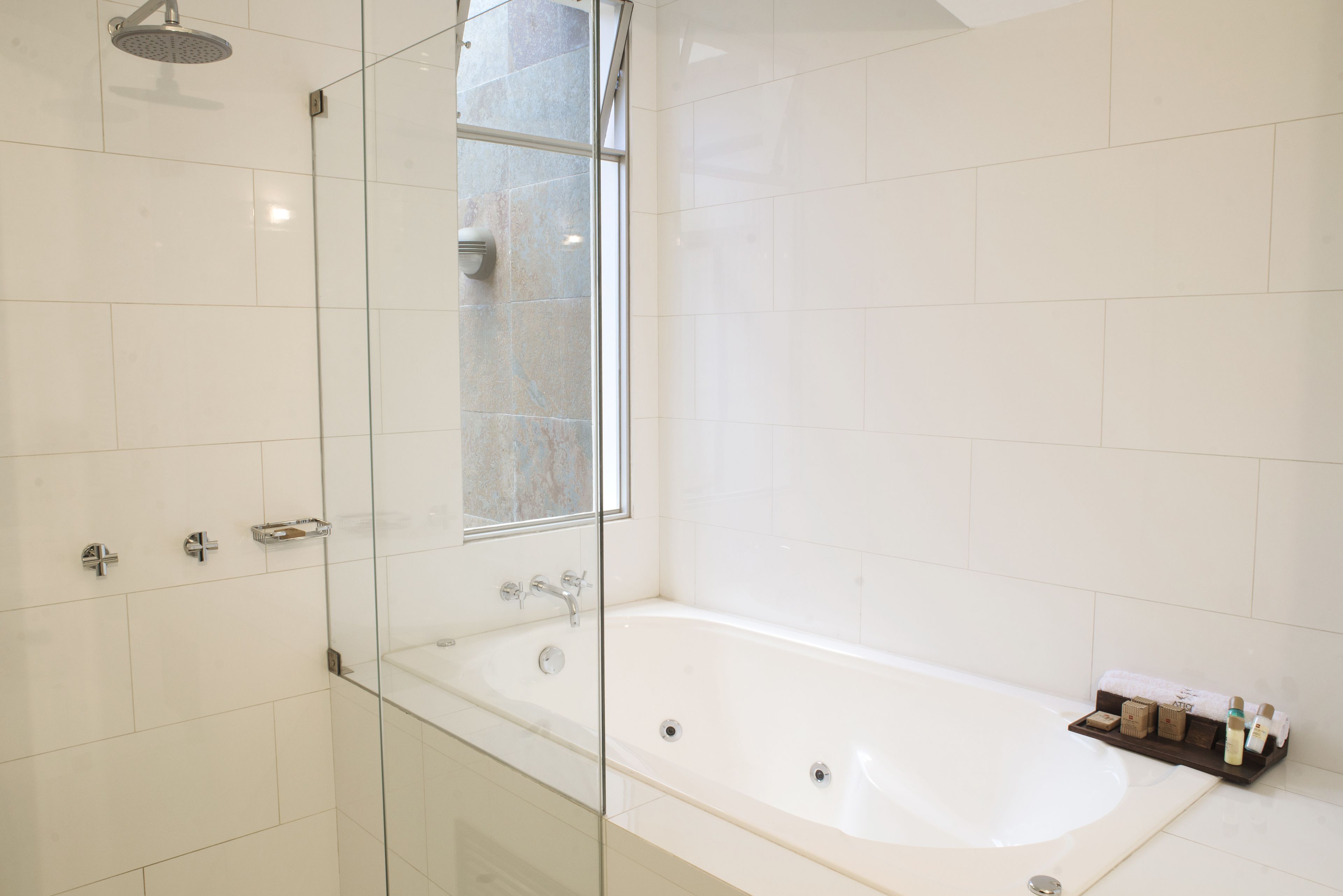 deluxe suite, jetted tub | 1 bedroom, premium bedding, down duvets, in-room safe