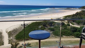 A balcony with a view of a beach and ocean. - Princess Palm on the Beach (Palm Beach)