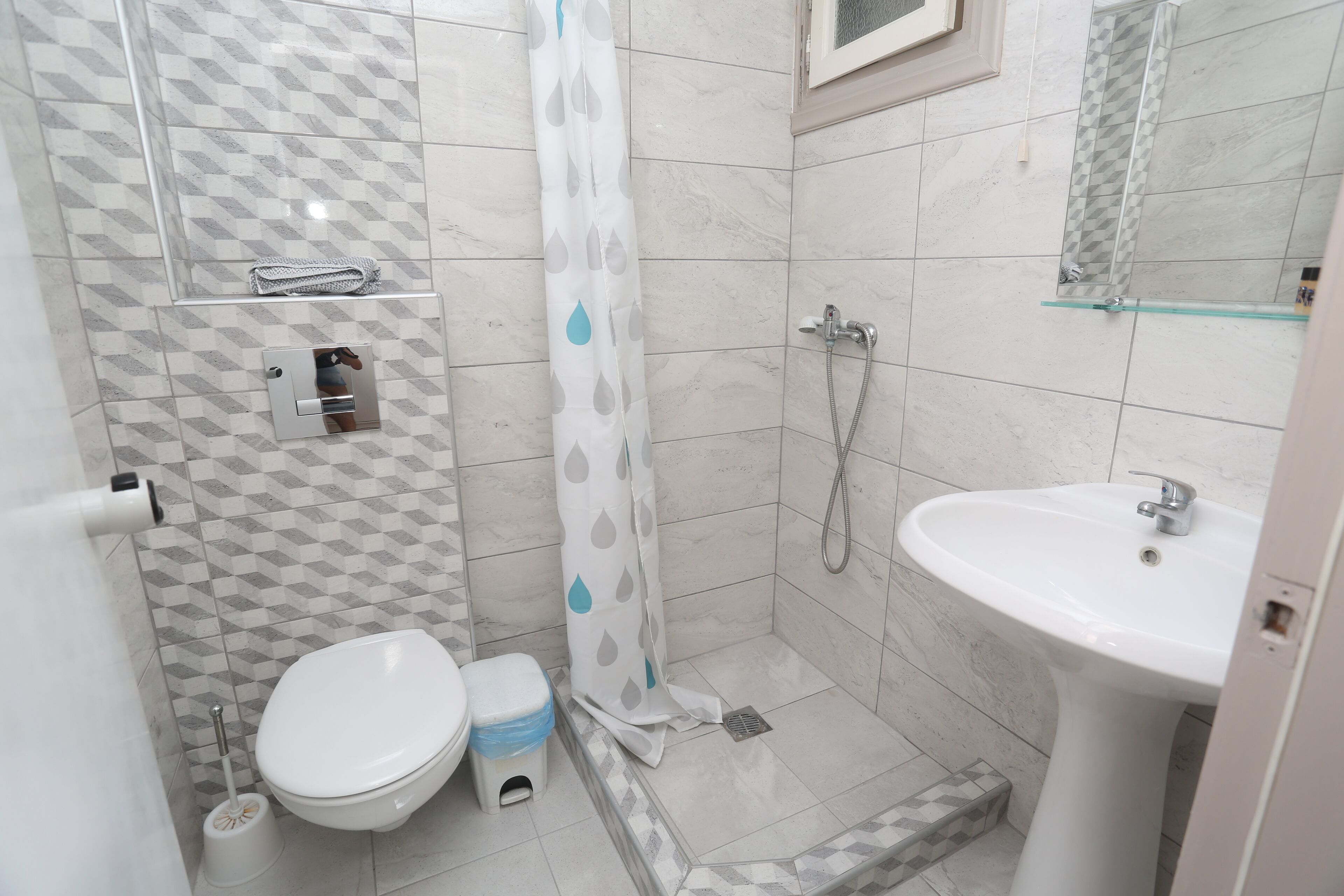 single room | bathroom | shower, hair dryer, towels