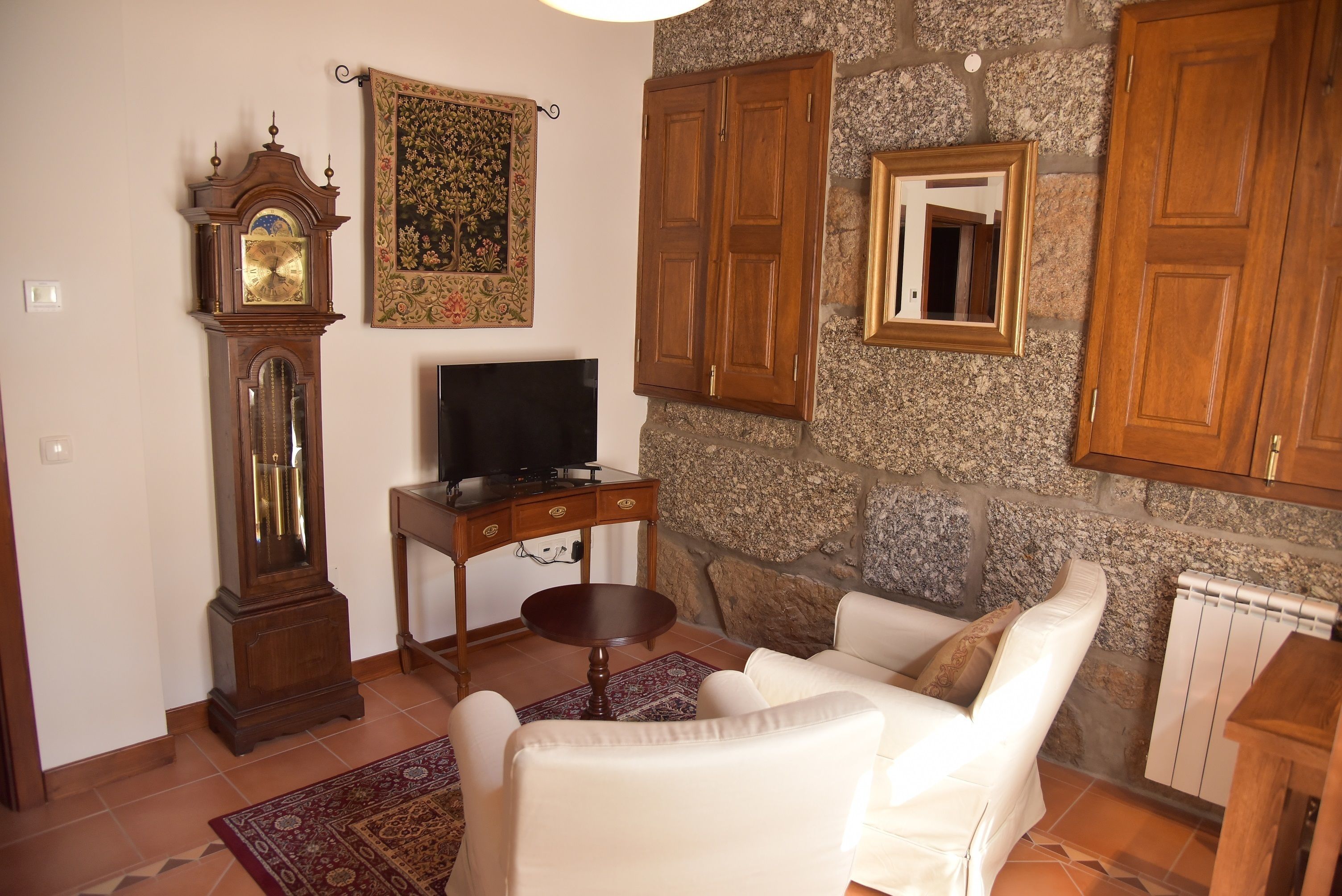 deluxe double room, 1 bedroom | living area | lcd tv