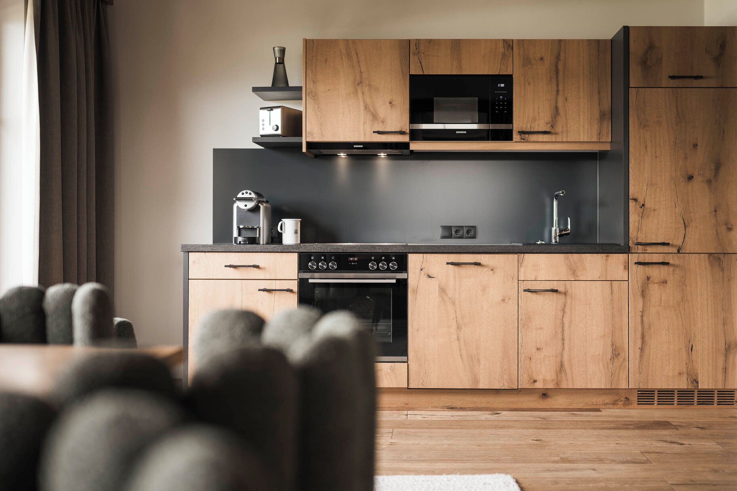 full-sized fridge, microwave, stovetop, espresso maker