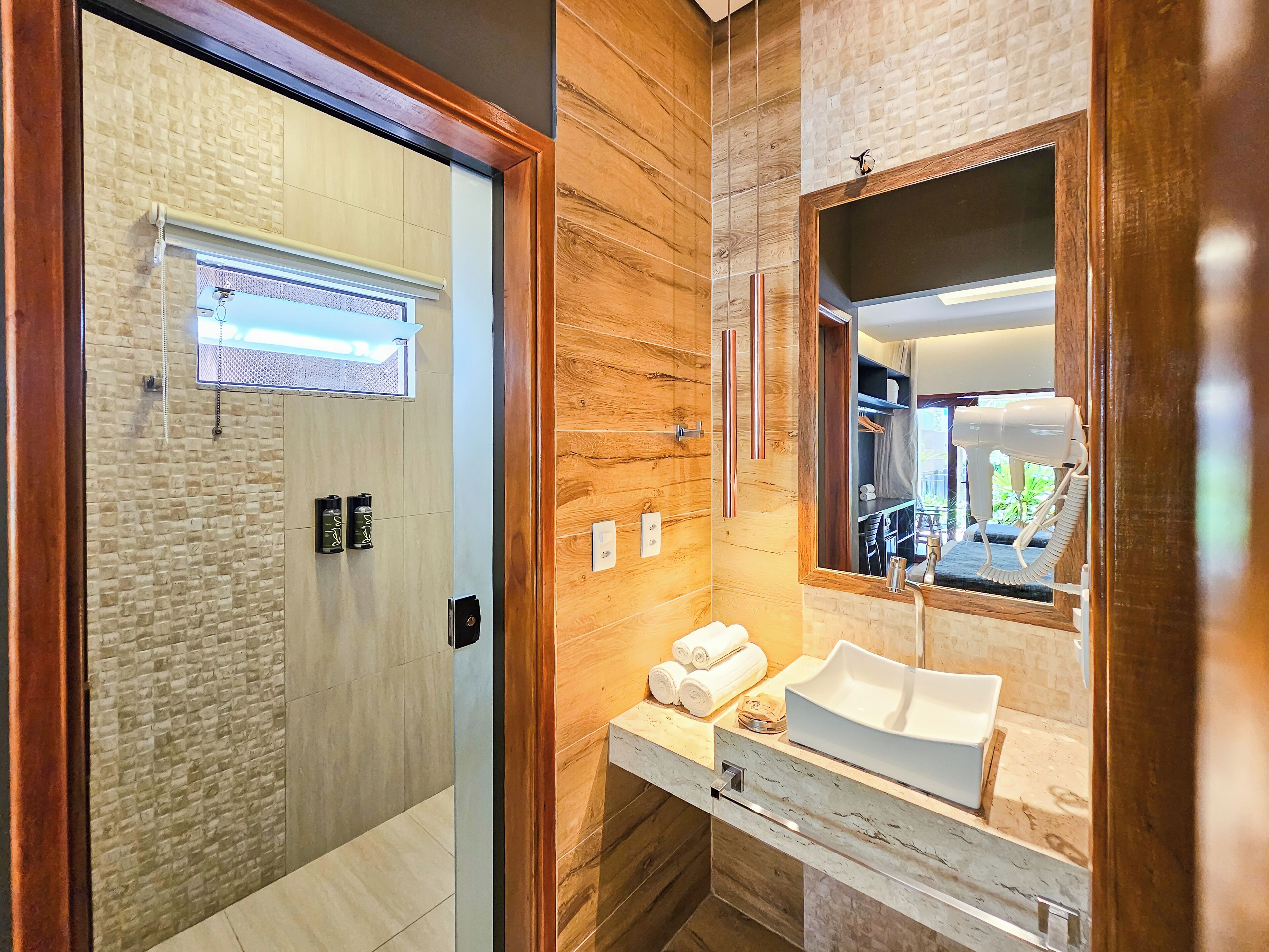 shower, free toiletries, hair dryer, towels