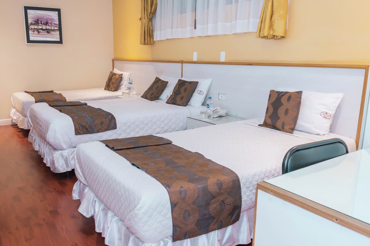 Quadruple Room | Premium bedding, minibar, in-room safe, desk