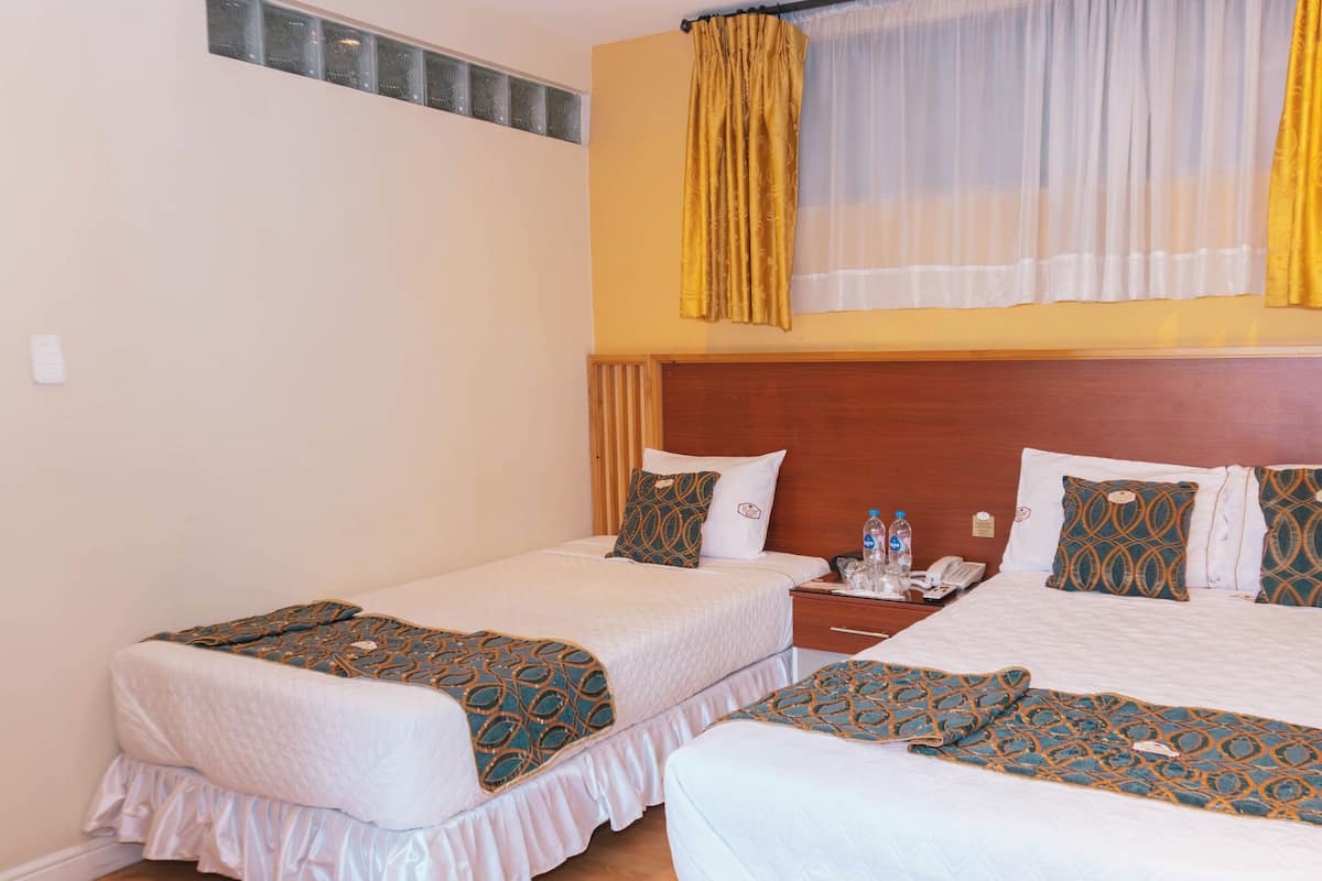Triple Room | Premium bedding, minibar, in-room safe, desk