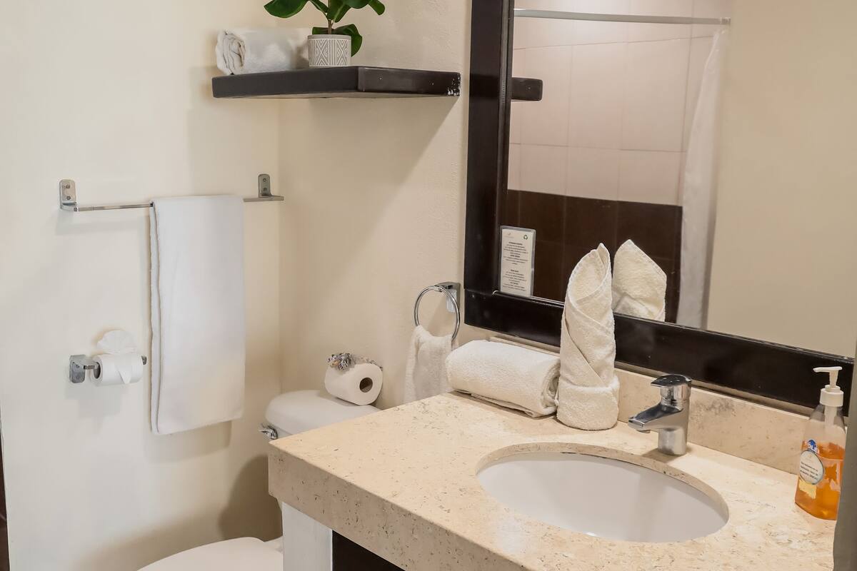 suite | bathroom | shower, free toiletries, towels