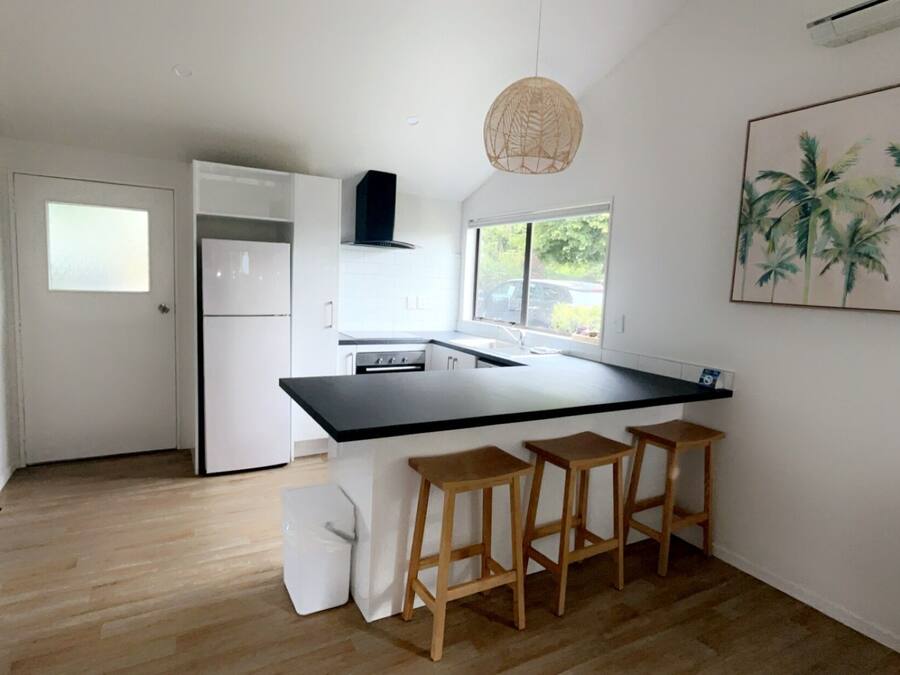 Deluxe Room | Private kitchen | Fridge, microwave, toaster, high chair