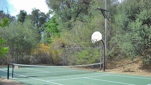 An outdoor tennis court surrounded by trees. - Oakzanita Springs RV Campground (Descanso)