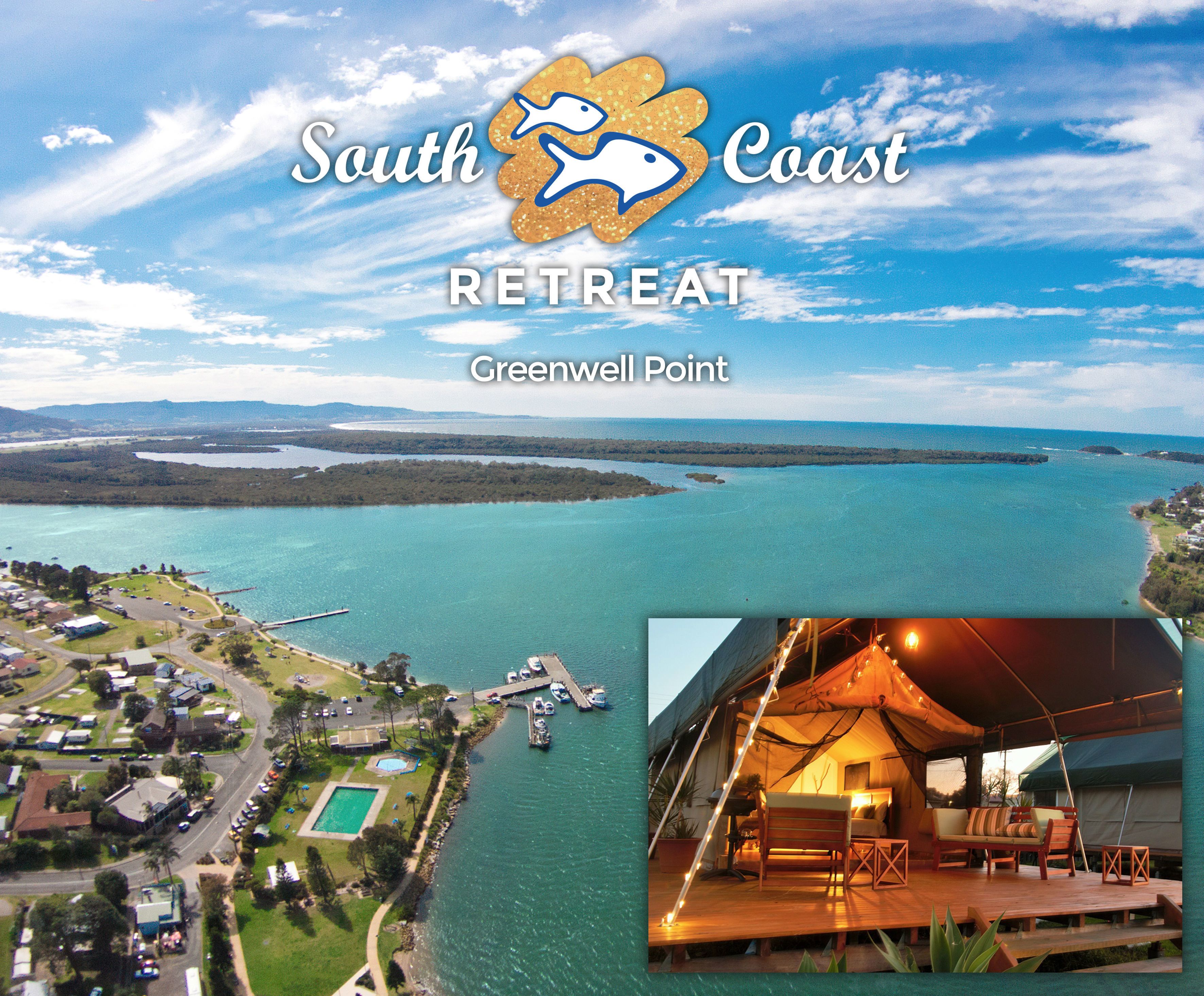 A coastal view of a retreat with a dock, a tented accommodation, and a clear sky.