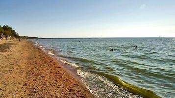 On the beach, fishing