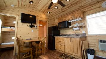 Fridge, microwave, coffee/tea maker, cookware/dishes/utensils