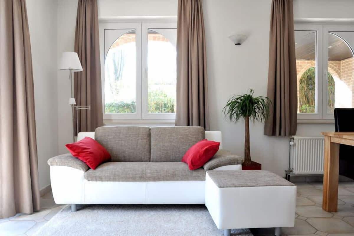 Appartement, 1 chambre | Coin séjour | Télévision à écran plat, station d'accueil iPod