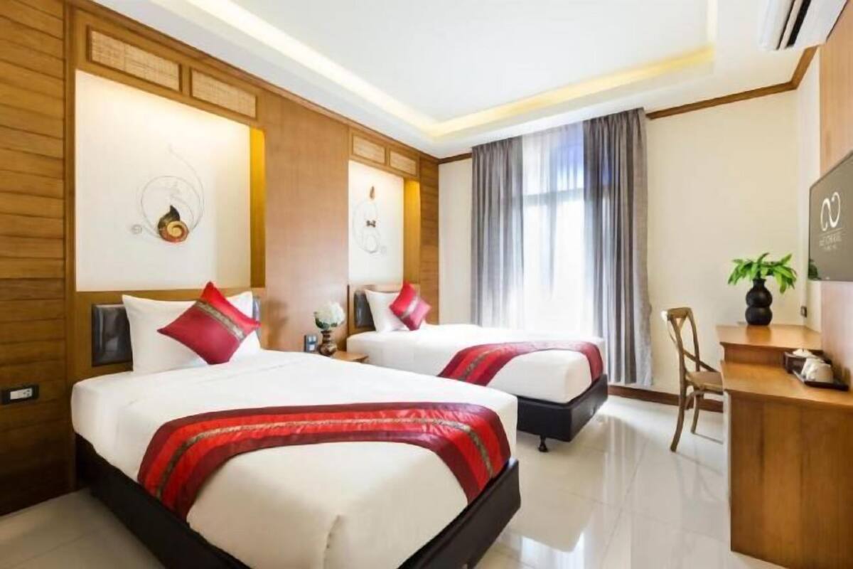Premium bedding, in-room safe, desk, iron/ironing board (on request)