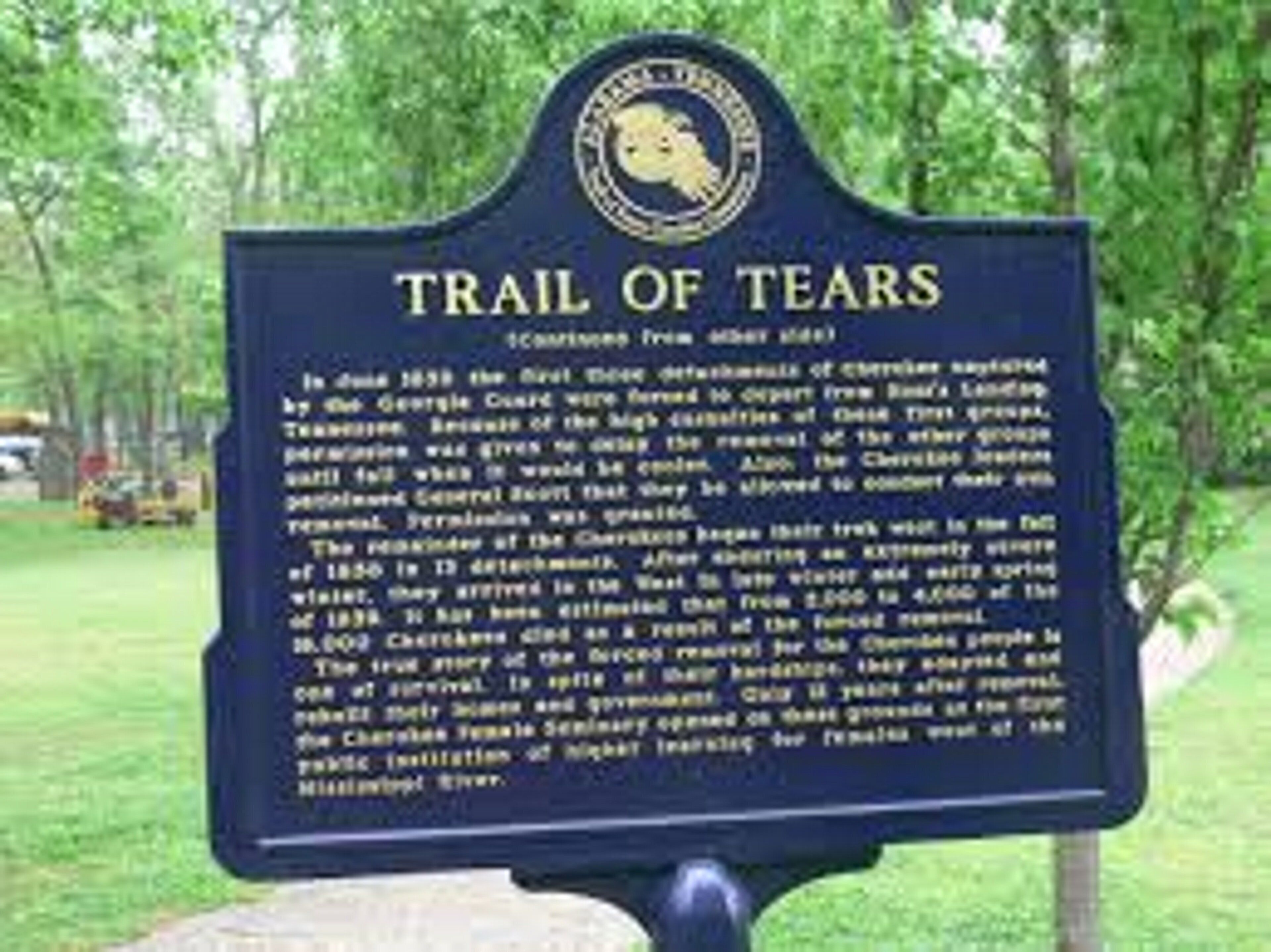 A historical marker titled 'Trail of Tears' with a detailed description of the Cherokee removal in 1838.