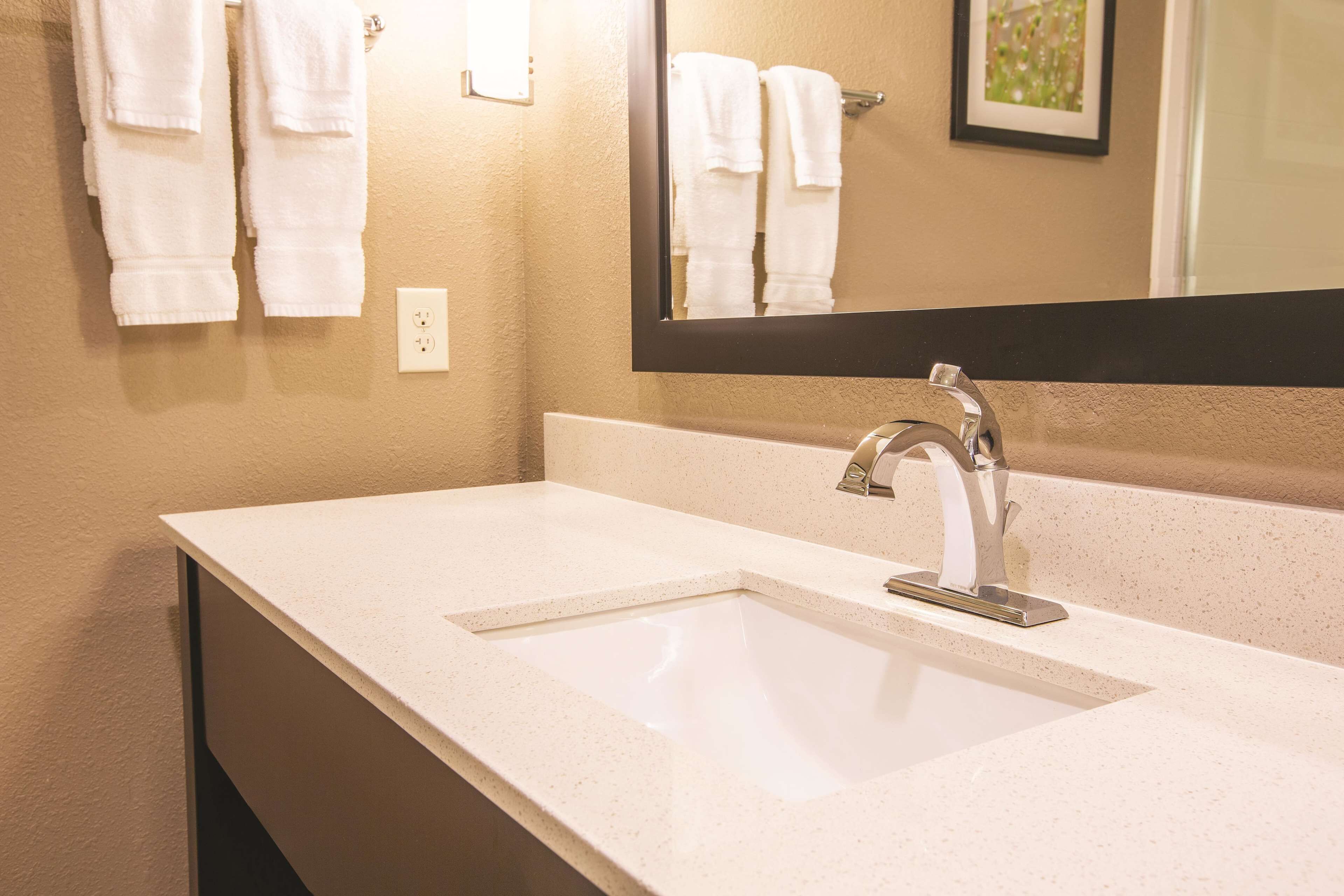 premium bedding, desk, blackout curtains, iron/ironing board