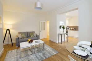 Flat-screen TV, DVD player, iPod dock