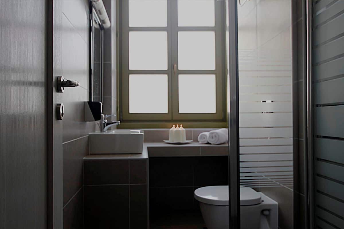 shower, rainfall showerhead, hair dryer, slippers