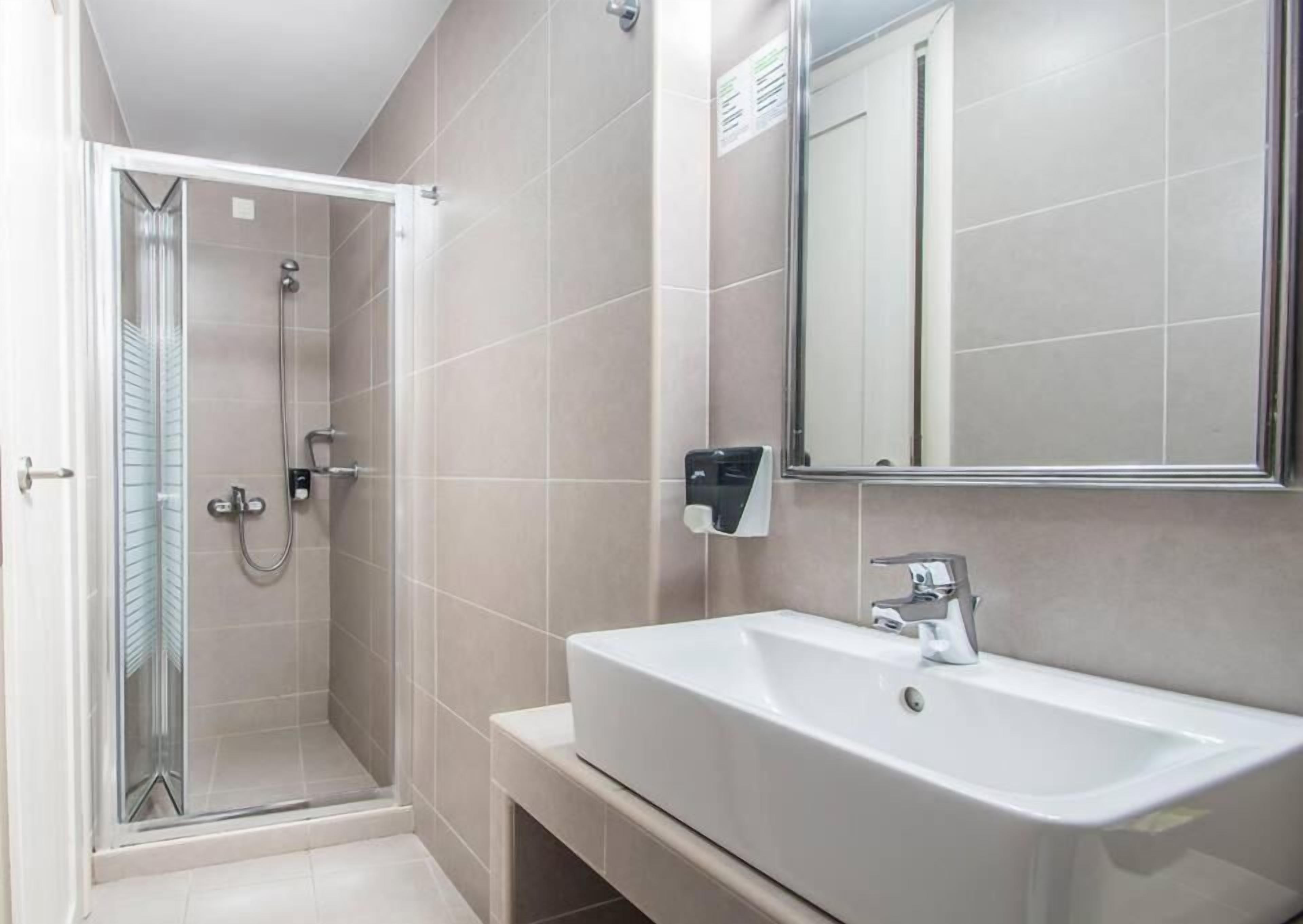 shower, rainfall showerhead, hair dryer, slippers