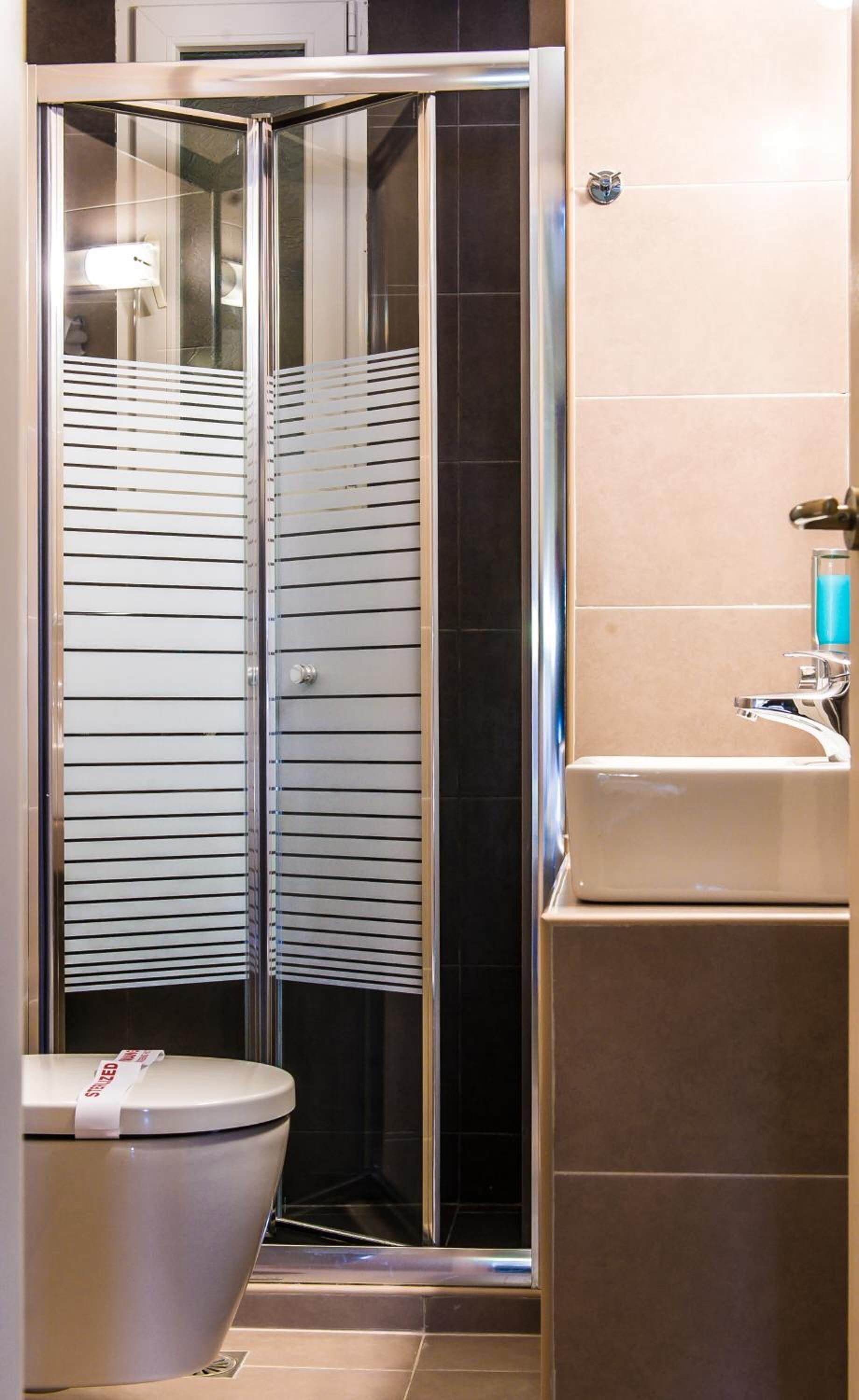 shower, rainfall showerhead, hair dryer, slippers