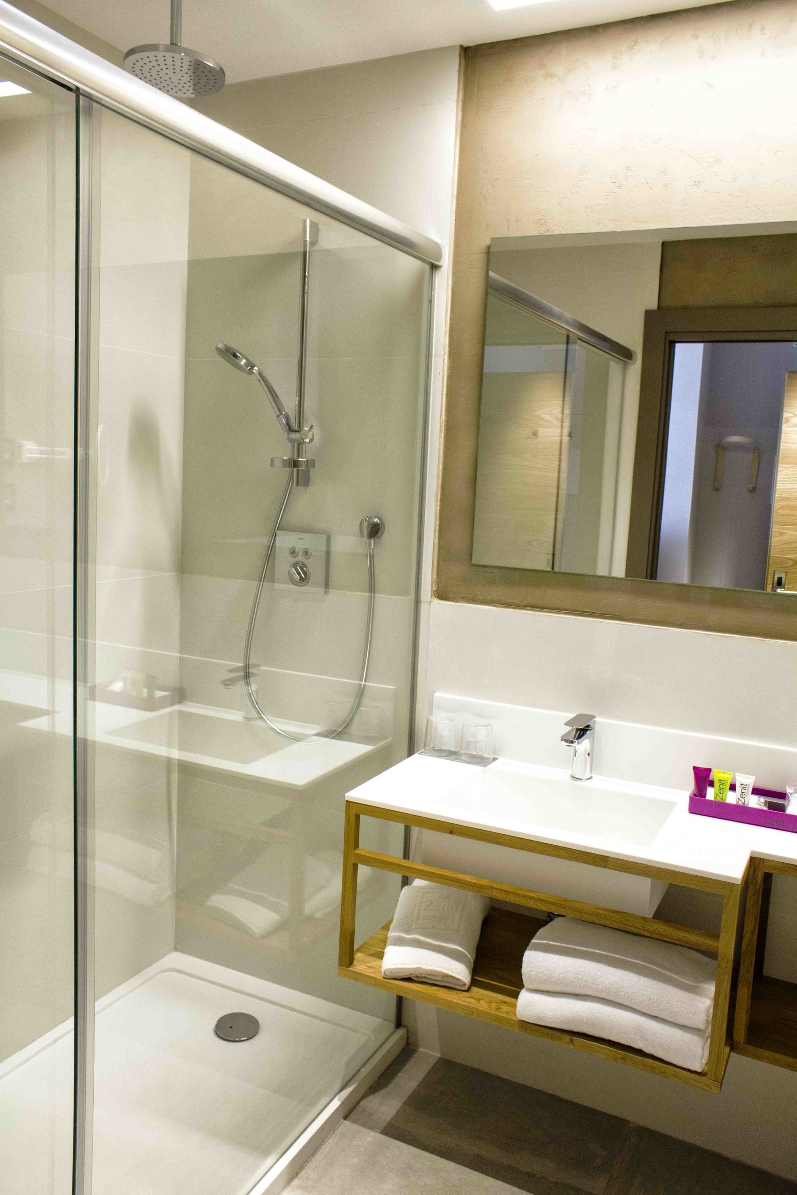 eco-friendly toiletries, hair dryer, towels, soap