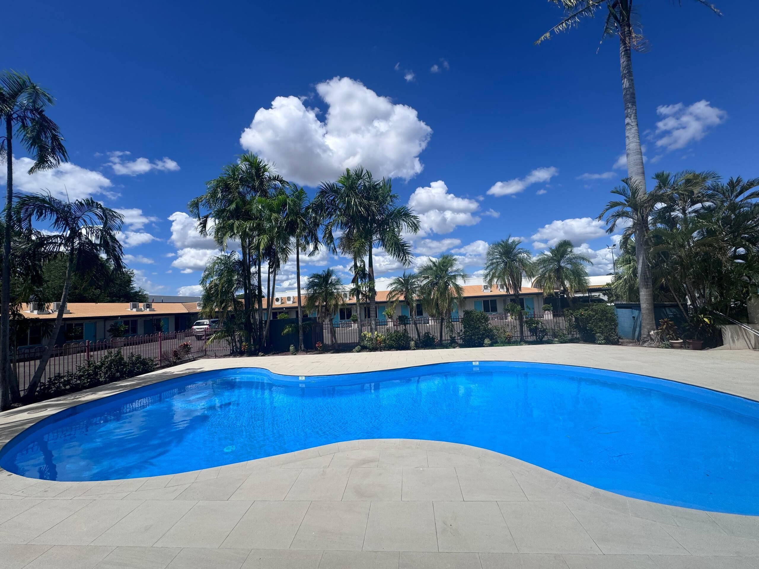 Outdoor pool, open 7:00 AM to 8:00 PM, pool loungers
