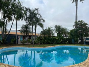 Outdoor pool, open 7:00 AM to 8:00 PM, pool loungers