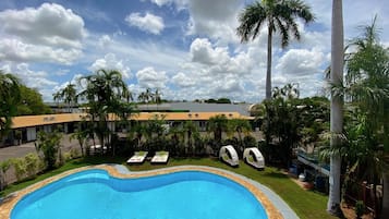 Outdoor pool, open 7:00 AM to 8:00 PM, pool loungers