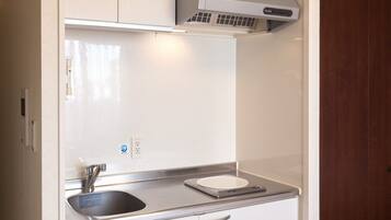 Fridge, microwave, cookware/dishes/utensils
