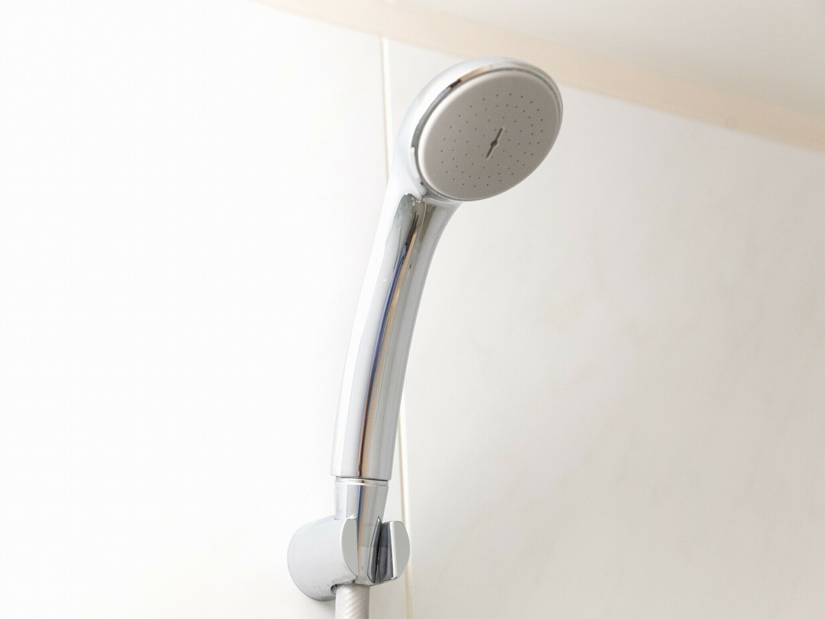 shower, hair dryer, bathrobes, slippers