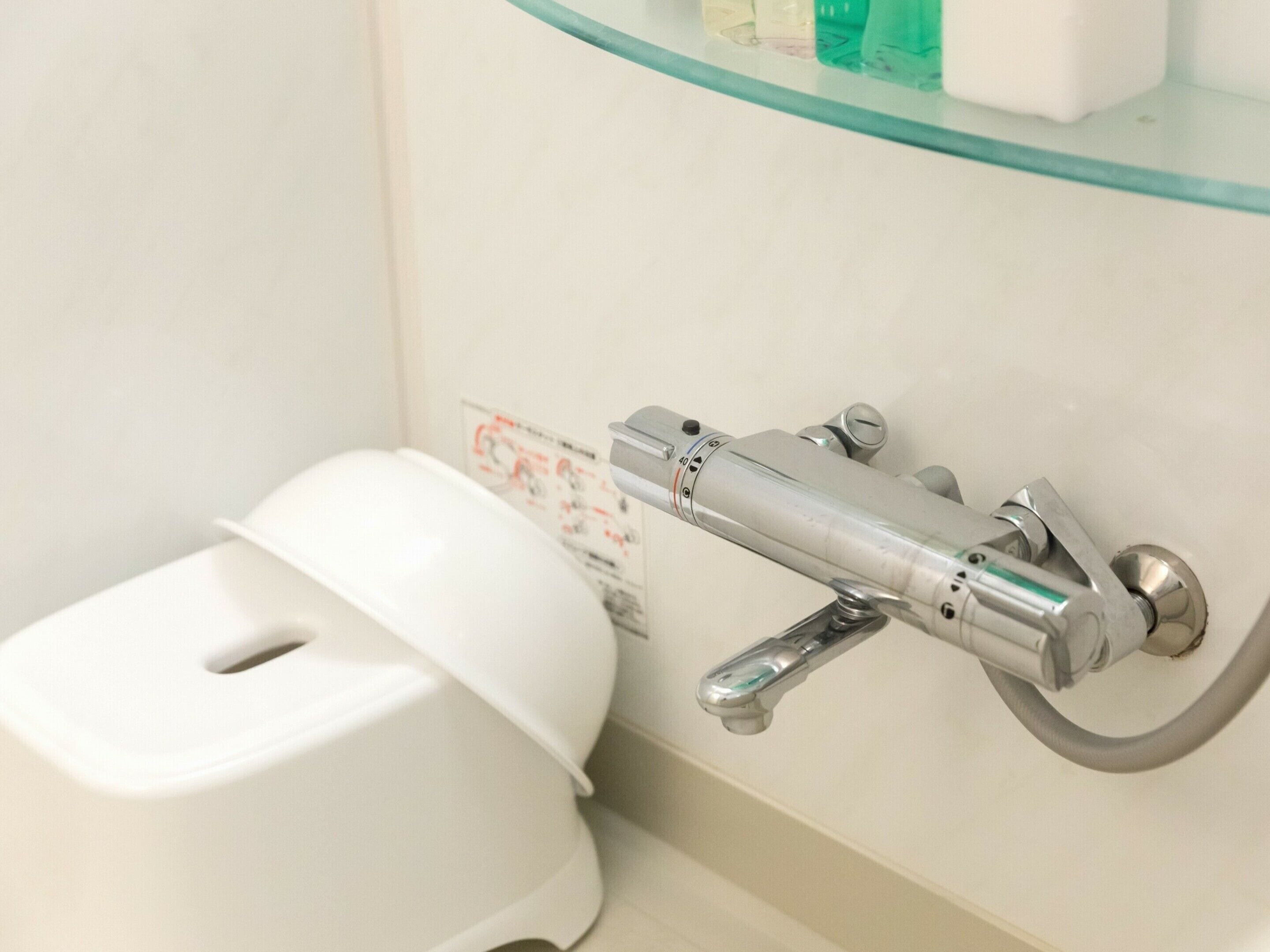 shower, hair dryer, bathrobes, slippers