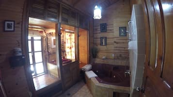 Deluxe Suite, 1 King Bed, Jetted Tub, Garden View (A/C) | Jetted bathtub