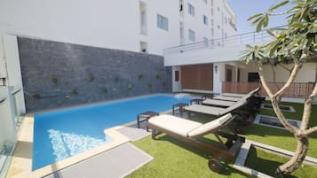 Outdoor pool, pool umbrellas, pool loungers