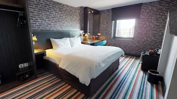 Desk, laptop workspace, blackout drapes, iron/ironing board