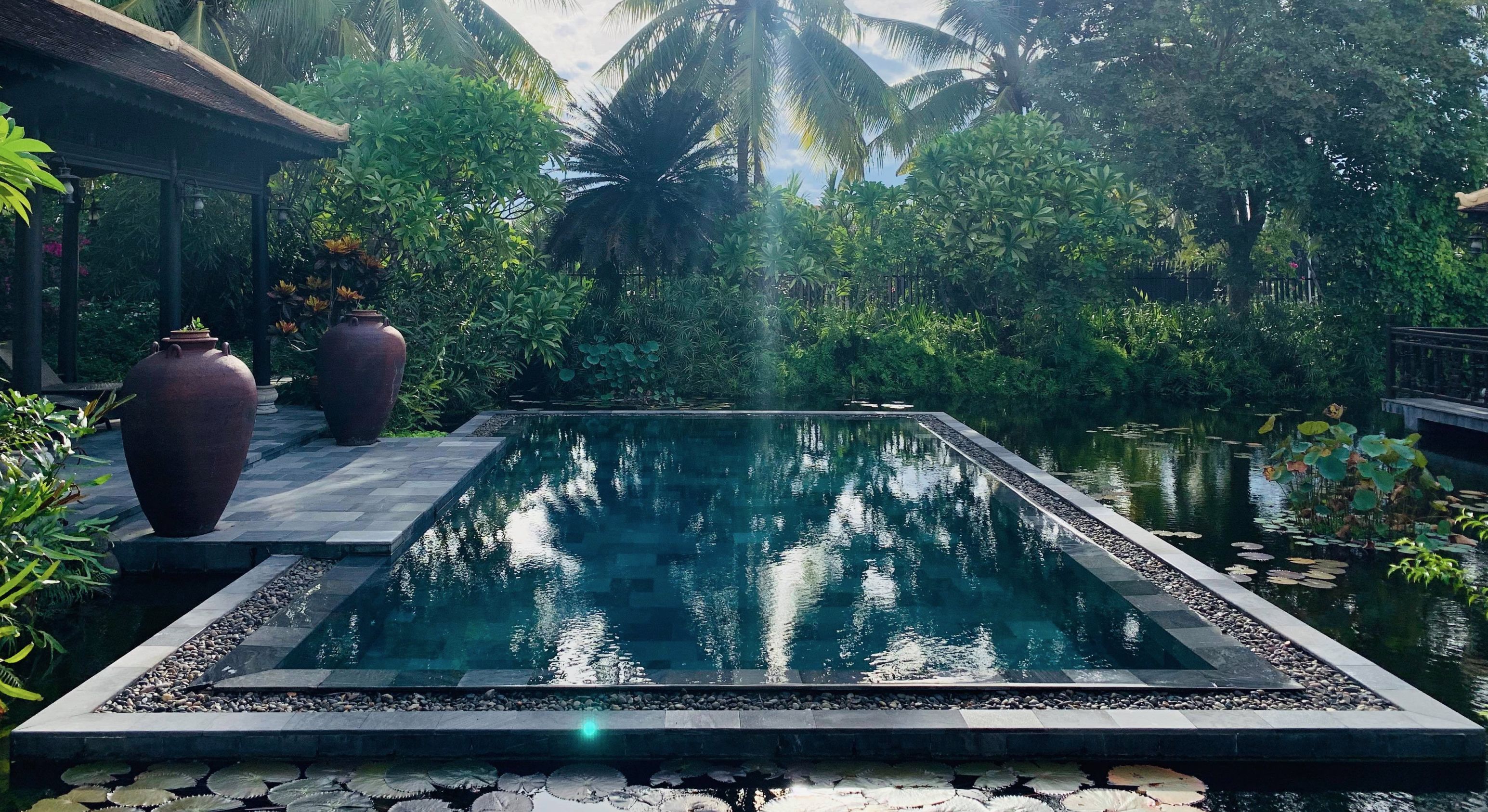 Outdoor pool, open 6:00 AM to 10:00 PM, pool loungers