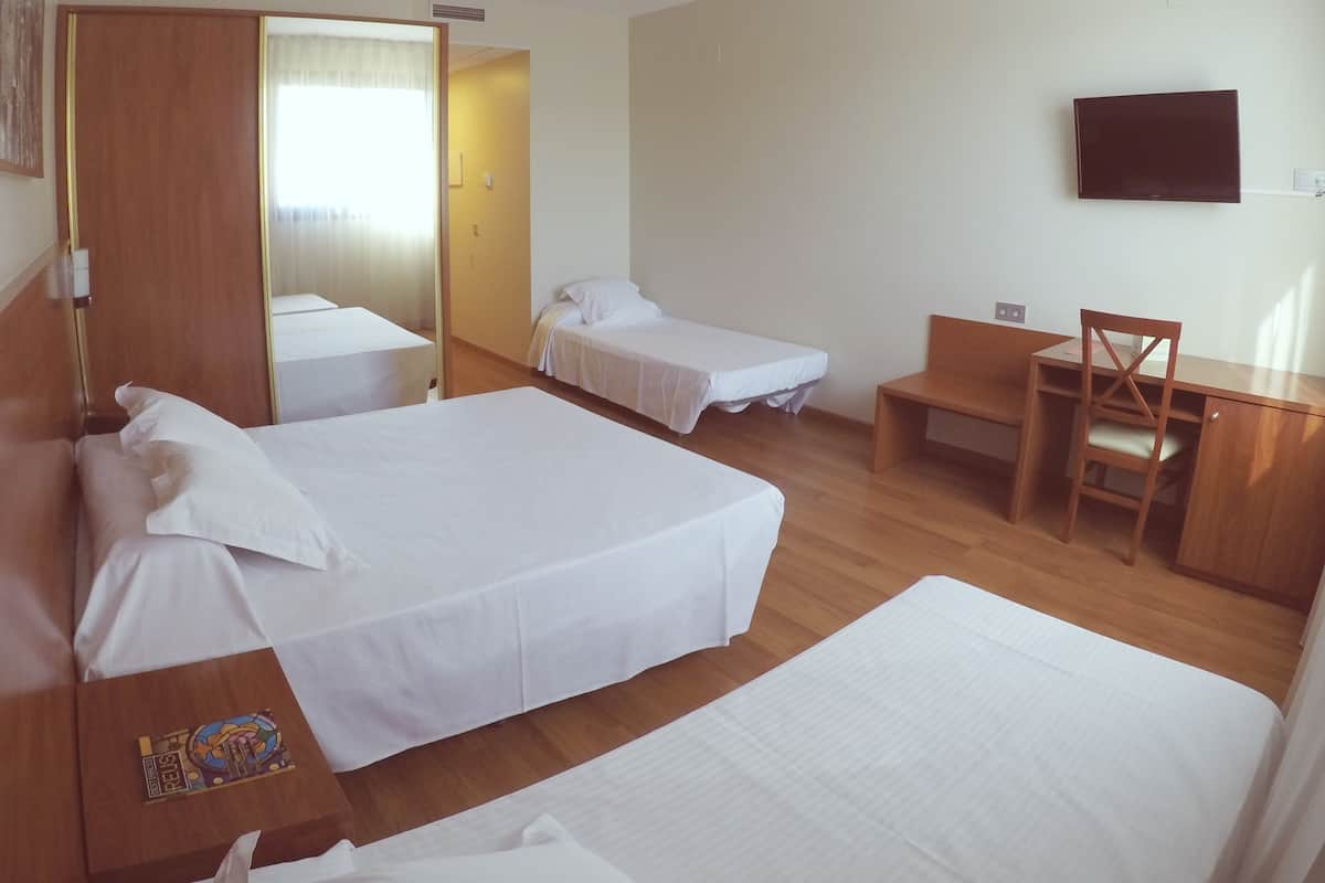 Minibar, desk, cribs (free), WiFi (free)