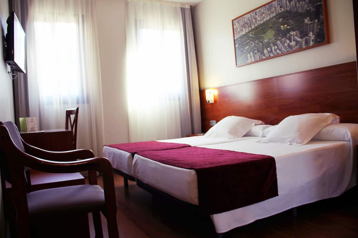 Minibar, desk, cribs (free), WiFi (free)
